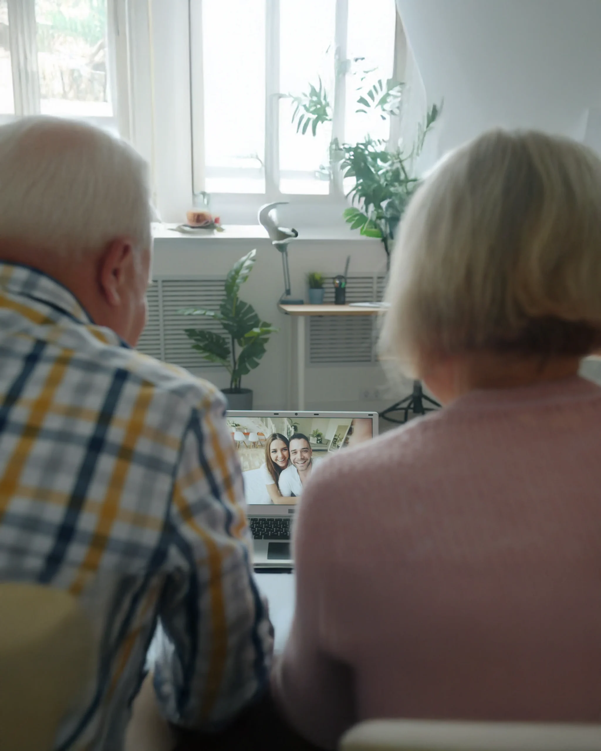 Senior couple face timing loved one