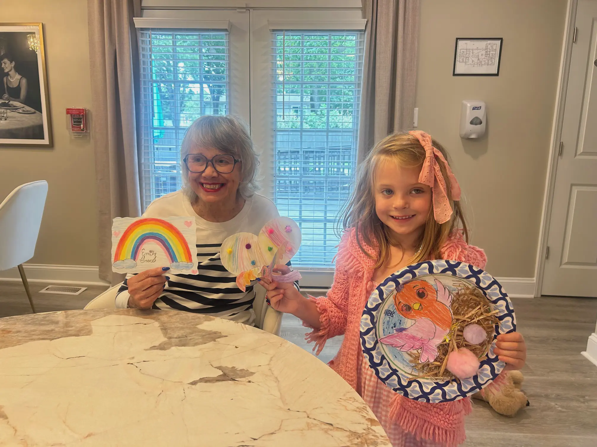 -Kids Activity at The House A happy granny whit a kid image